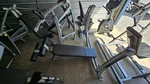 Cybex Prestige Decline Olympic Bench W/ Stainless Steel Barbell. Fixed Price $750.00.