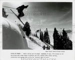 Press Photo Jumps Off Cliff As Other Skiers Look On In Utah. Fixed Price $24.99.